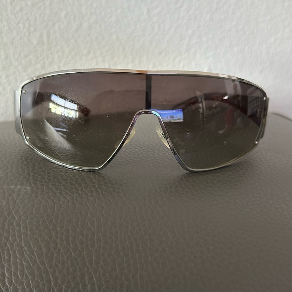 Gucci sunglasses. With Gucci logo on arms